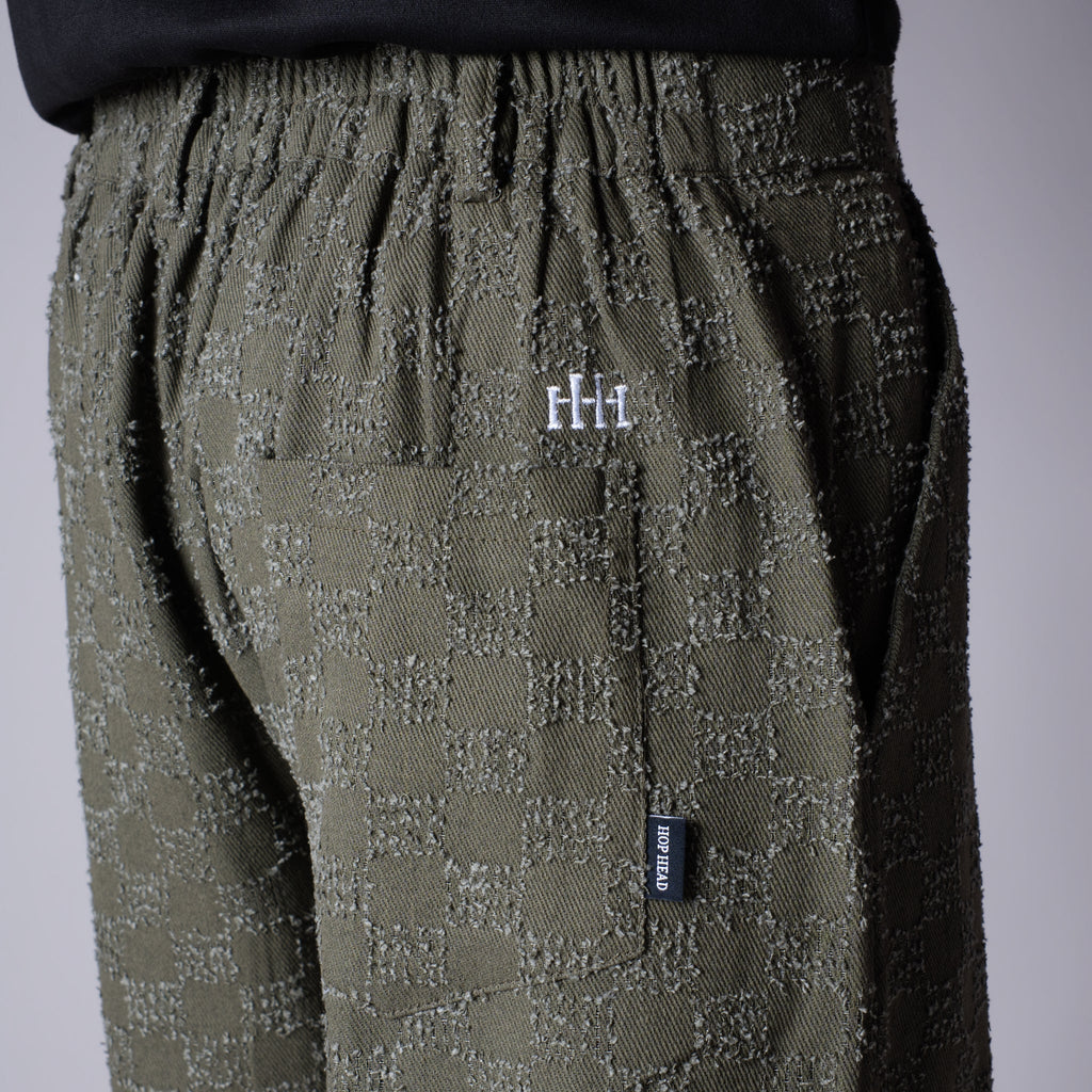OLIVE CHECKERED ROOFING BOOT CUT DENIM