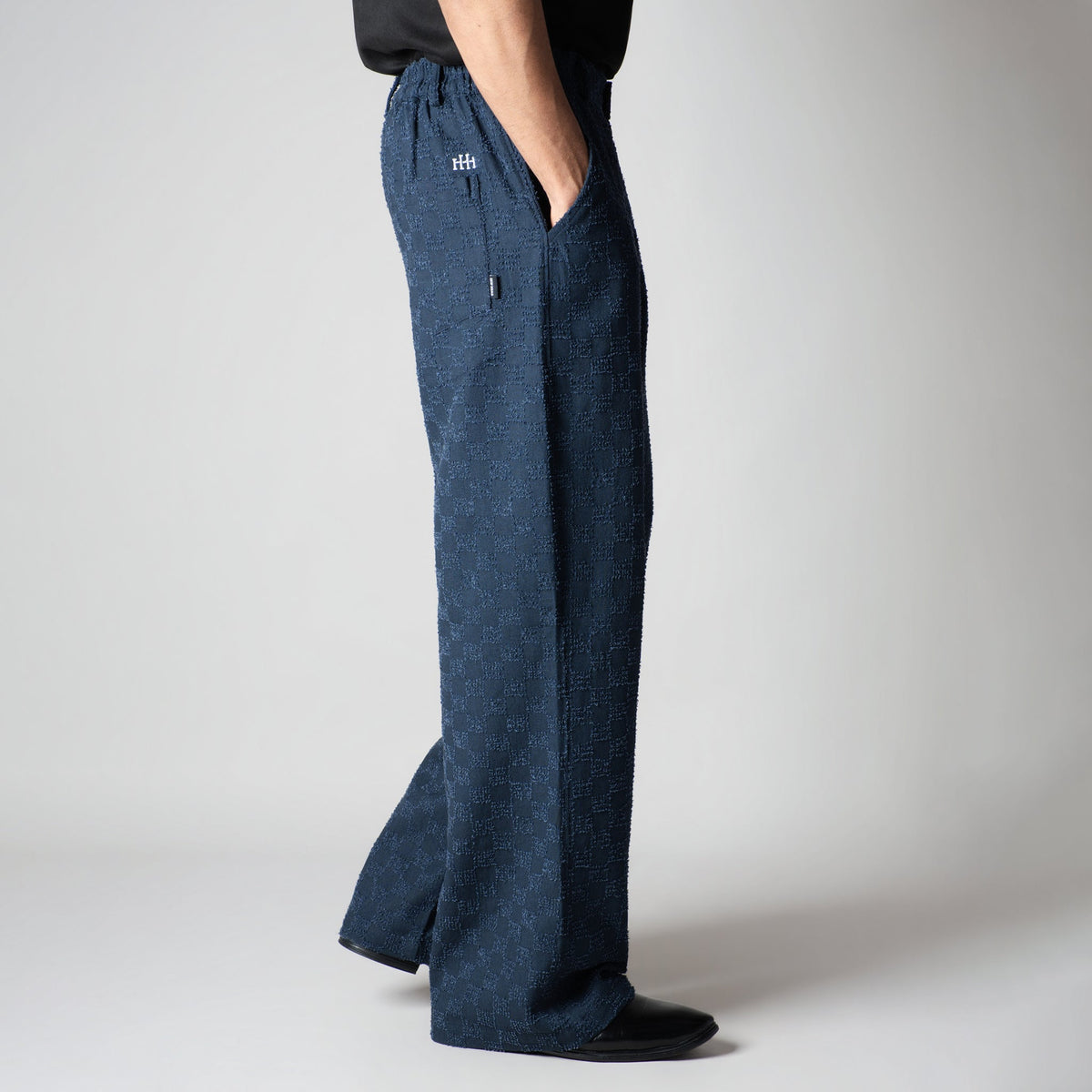 BLUE CHECKERED ROOFING BOOT CUT DENIM