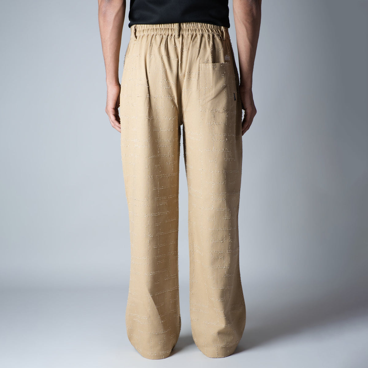 BEIGE ROOFING BOOT CUT DENIM