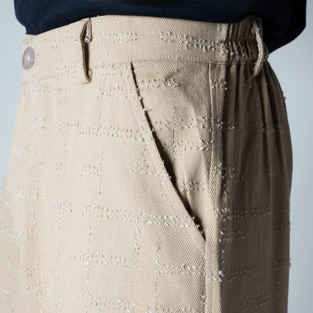 BEIGE ROOFING BOOT CUT DENIM