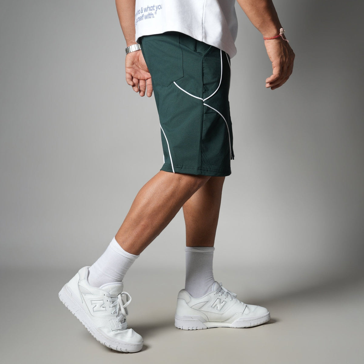 DARK GREEN VELOCITY CURVE SHORTS
