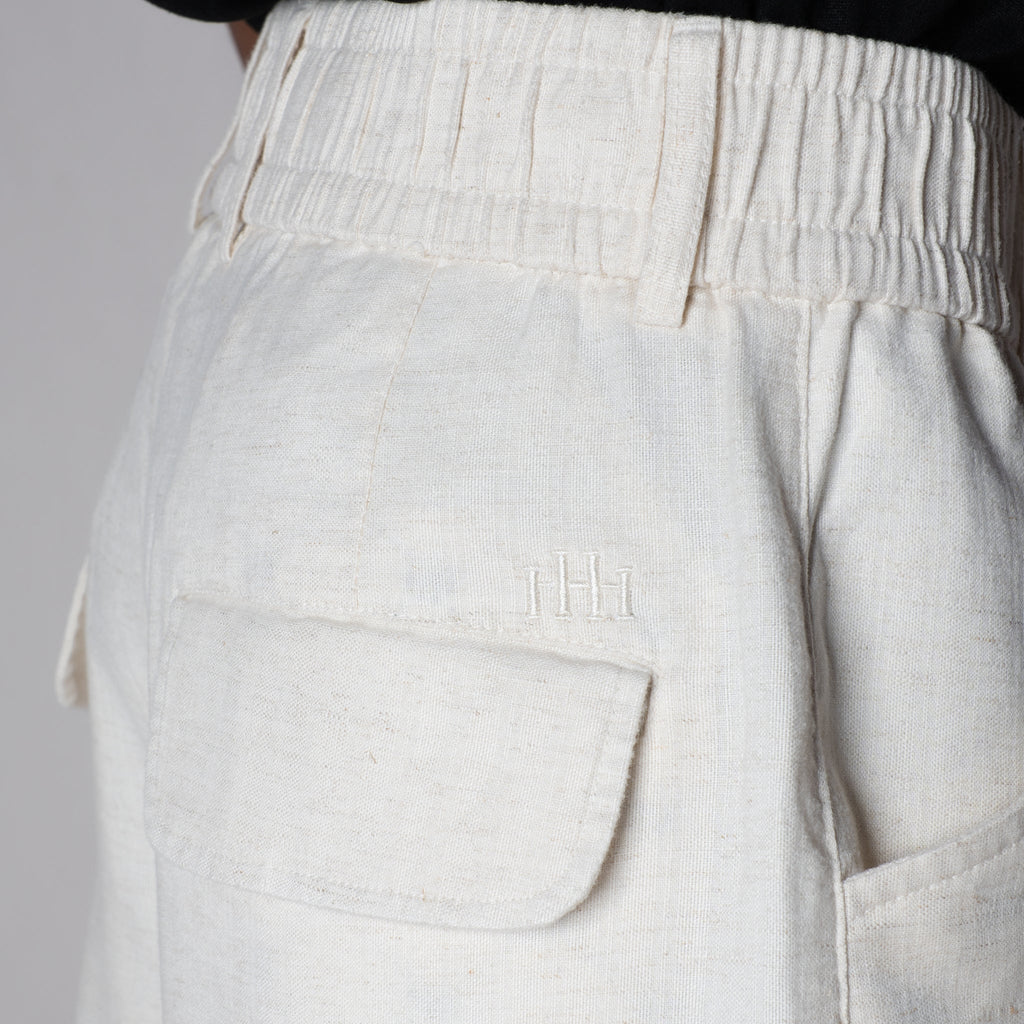 WHITE SOFTMOVE VERTICAL LINE SIGNATURE LINEN PANTS